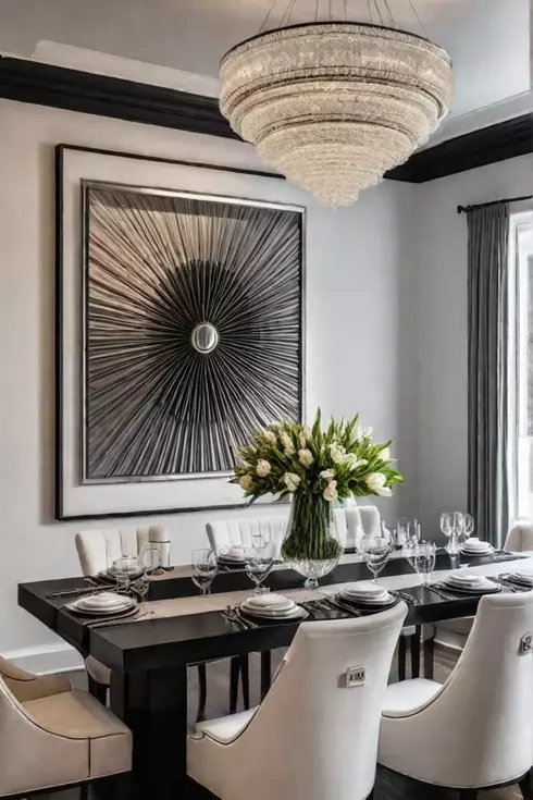 A dining room with carefully curated decorative accents including a vase of