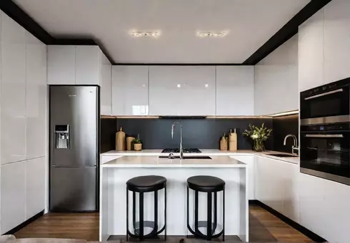 Freestanding kitchen island cabinet in a small modern apartment with sleek linesfeat