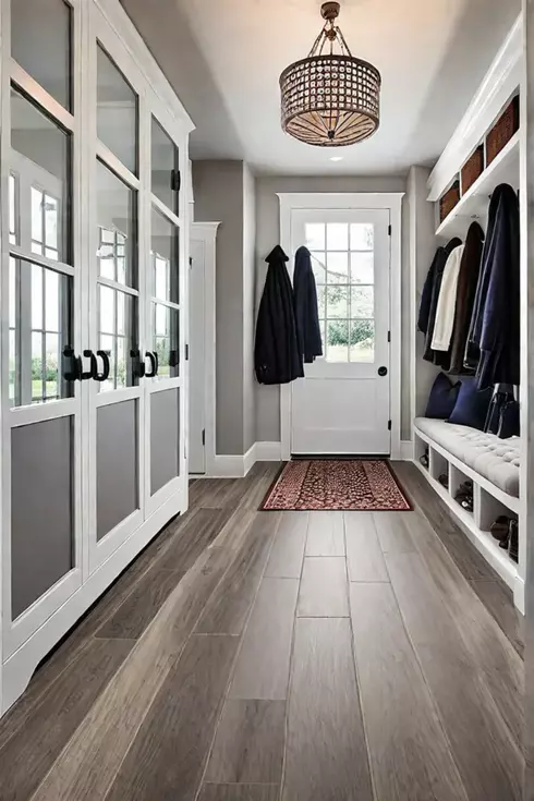 Comfortable and stylish mudroom design with woodlook flooring