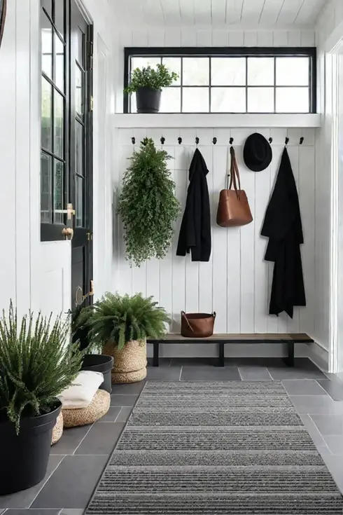 Modern farmhouse mudroom with vinyl flooring